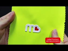 สัญลักษณ์ที่กําหนดเอง TPU OEM Garment Symphony