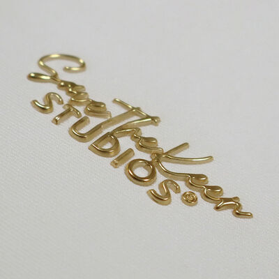 สัญลักษณ์การถ่ายทอดความร้อน TPU ทองคํา 3 มิติ ลายการถ่ายทอดความร้อนสําหรับเครื่องแต่งกาย