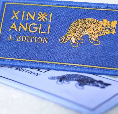 ป้ายพิมพ์ลายผ้าไหมแบบกำหนดเอง - ป้ายเสื้อผ้าลายโลโก้แบรนด์ลายเสือดาวสำหรับอุปกรณ์เสริมเสื้อผ้า