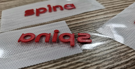 เสื้อผ้าที่กำหนดเอง 3D Transfer Label ซิลิโคนพลาสติกยาง Material